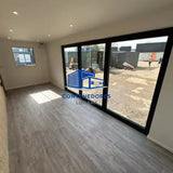 CONTENEDOR DE OFICINA 6,4 X 2,4 M CON PUERTA PLEGABLE