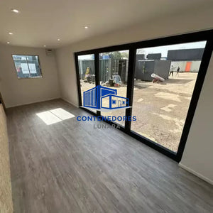 CONTENEDOR DE OFICINA 6,4 X 2,4 M CON PUERTA PLEGABLE